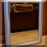 DM02. Beveled glass mirror with silver colored frame. 